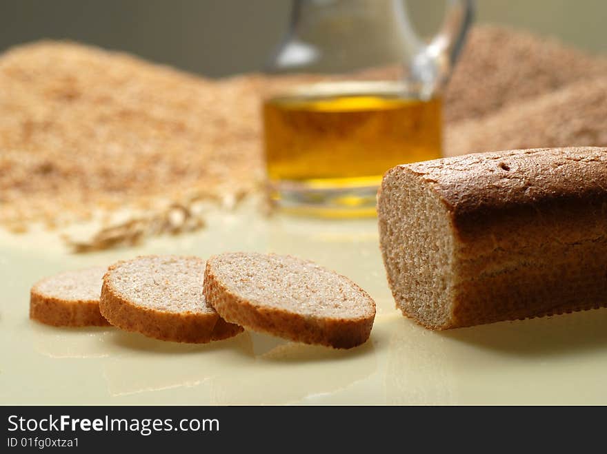 Bread and different ingredients used to bake this type of meal. Bread and different ingredients used to bake this type of meal