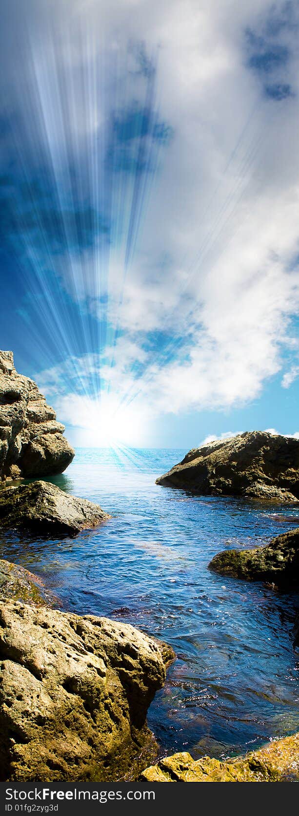 Blue sea tide between rocks