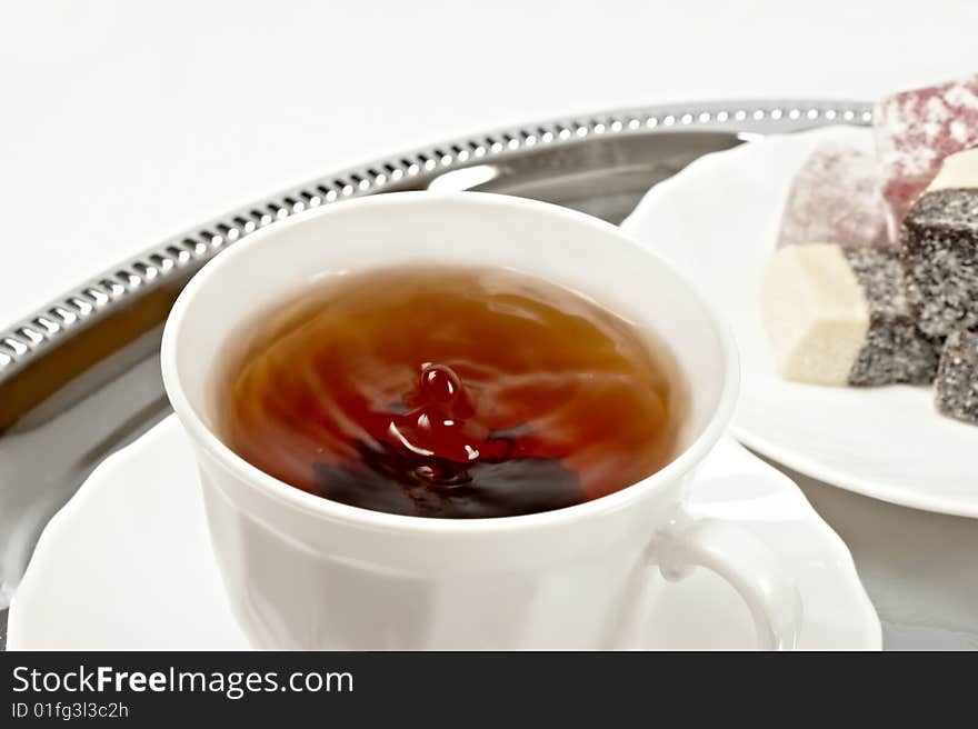 Cup of hot tea on silver tray. Cup of hot tea on silver tray