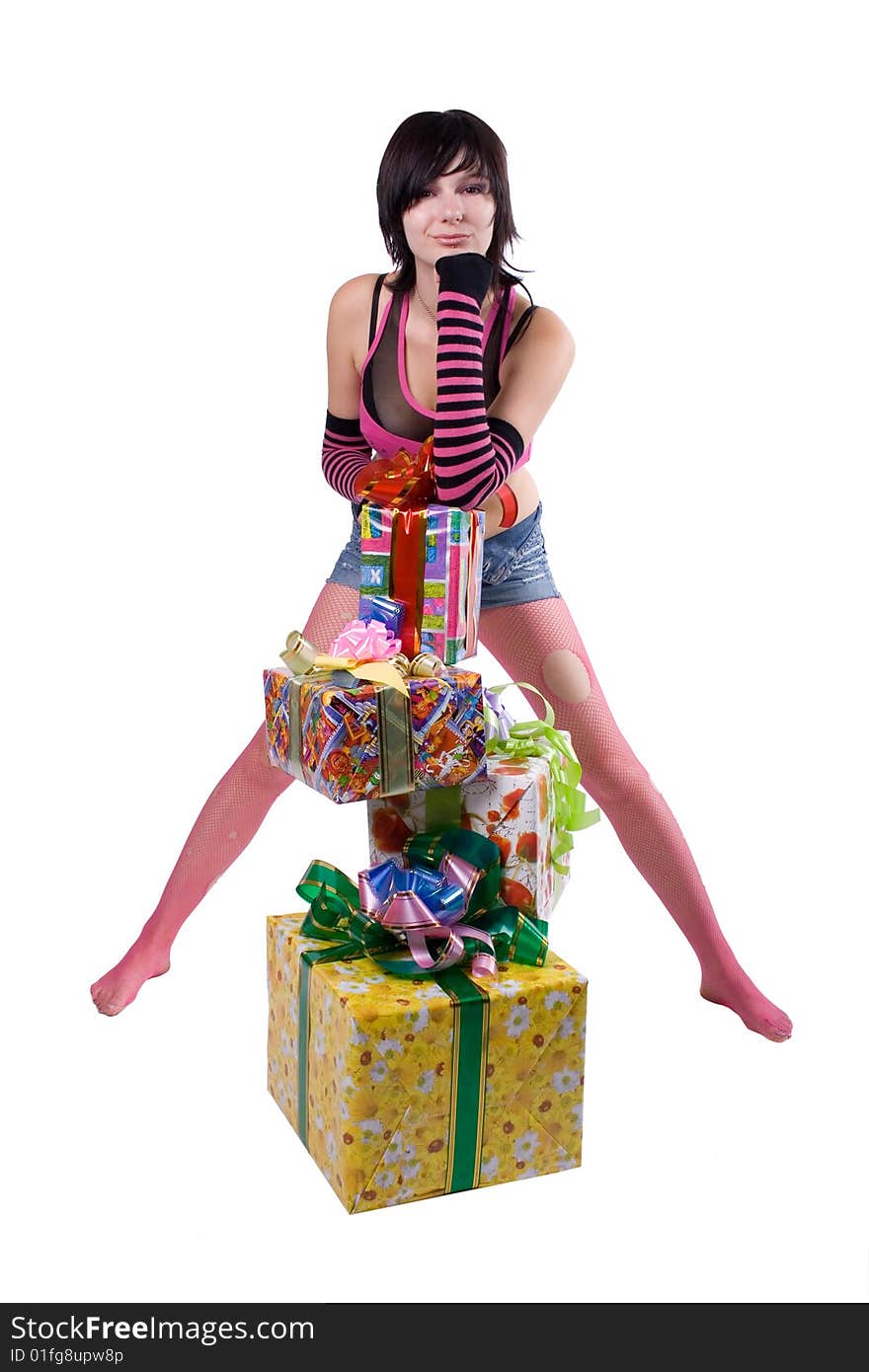 The young beautiful girl with a gift box on a white background