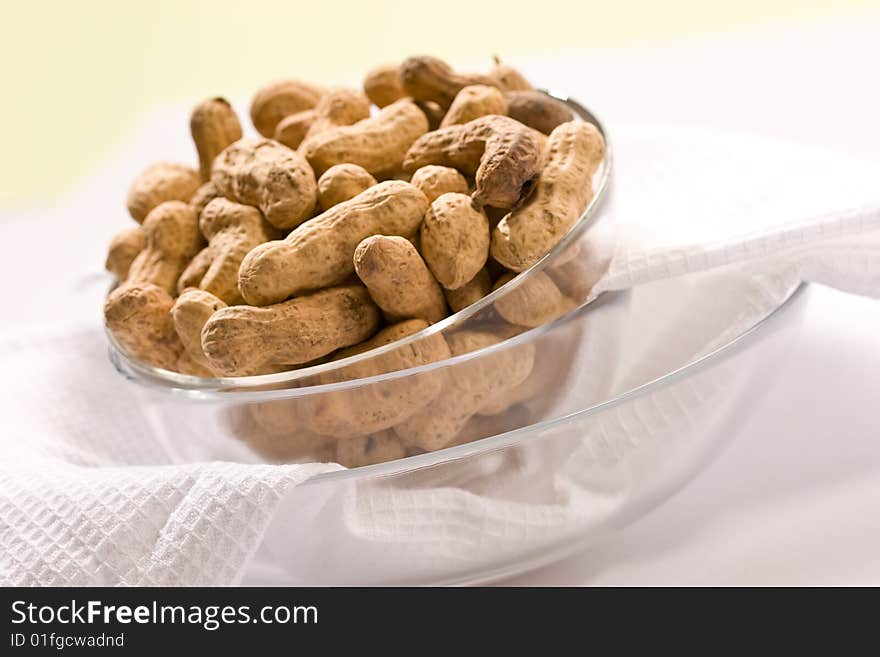 Foodstuff theme:  peanut on the glassy bowl