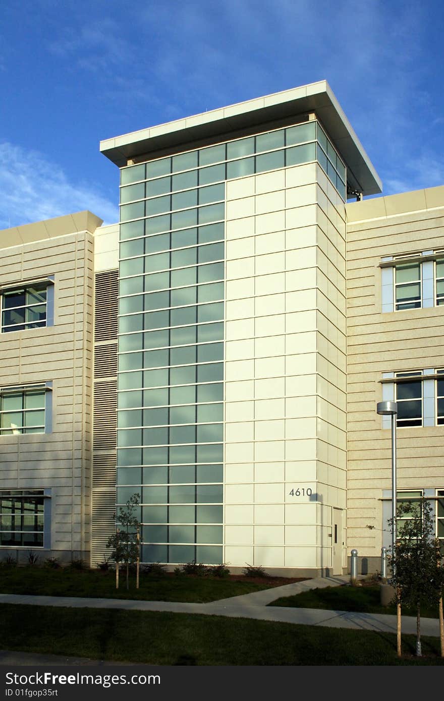 An office building with a empty parking lot