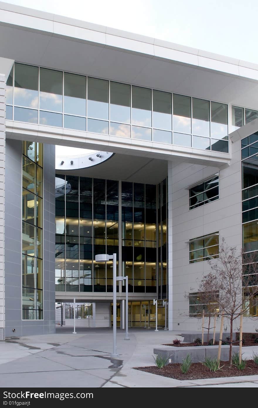 An office building with a empty parking lot