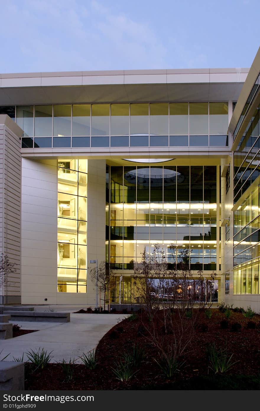 An office building with a empty parking lot