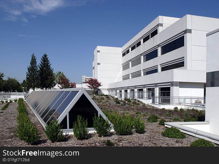 An office building with a empty parking lot