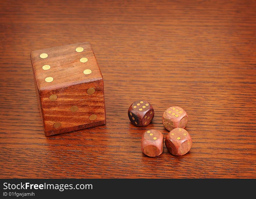 Wood dices with metallic points. Wood dices with metallic points