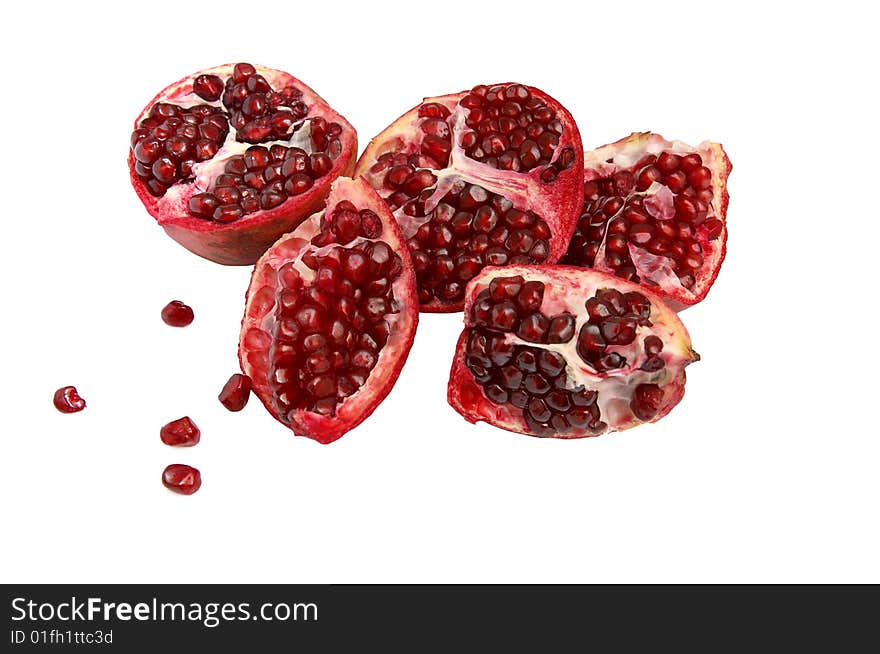 Colorful pomegranates on white background.