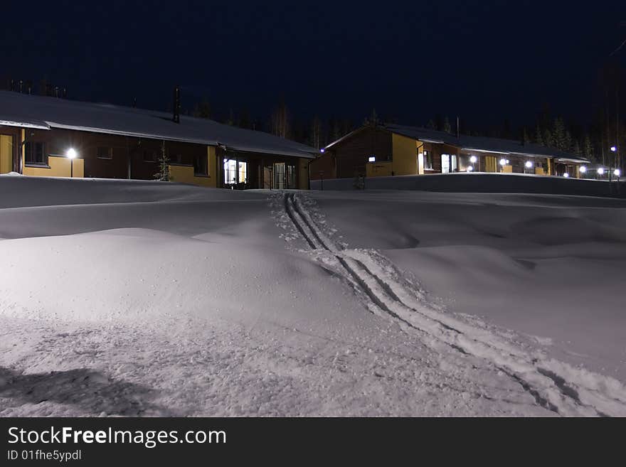 Winter Cottages And Traces From Skiing.