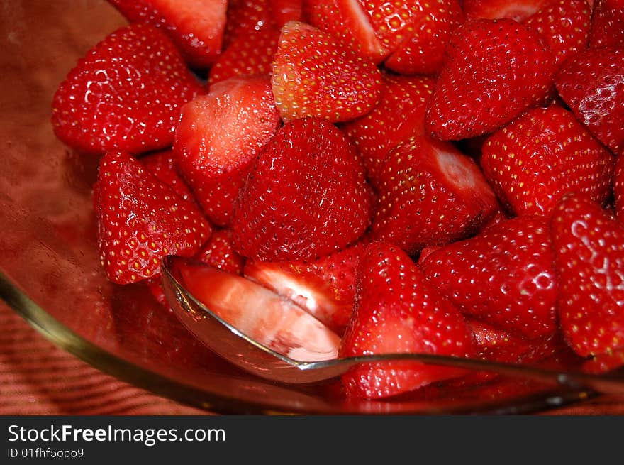 This is a bowl of fresh plump red strawberries.