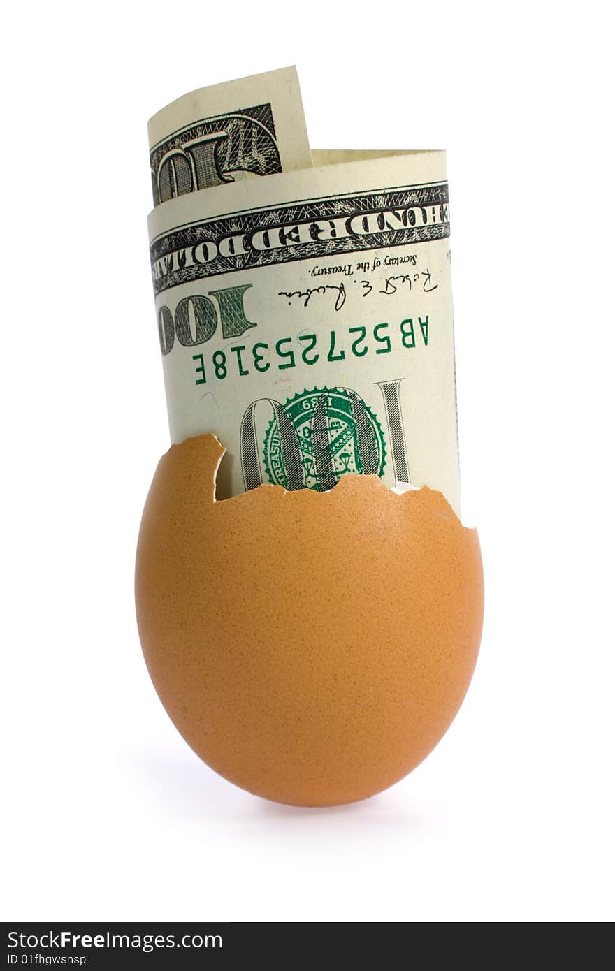 Egg with money on white.