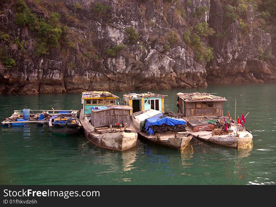 Fishing vessels in Ha Long bay in Vietnam. Fishing vessels in Ha Long bay in Vietnam