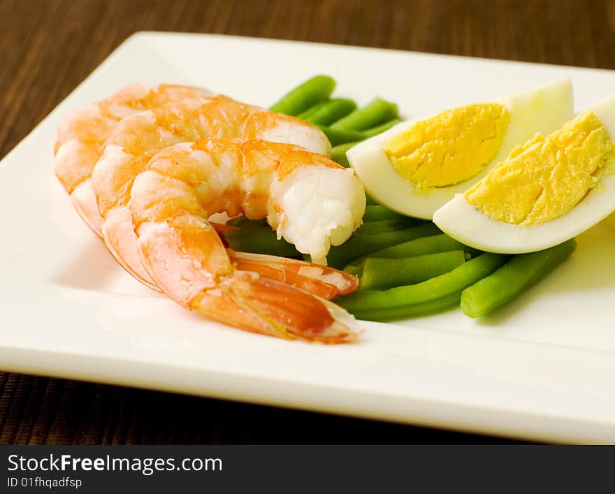 Delicious salad of shrimps with eggs and green beans