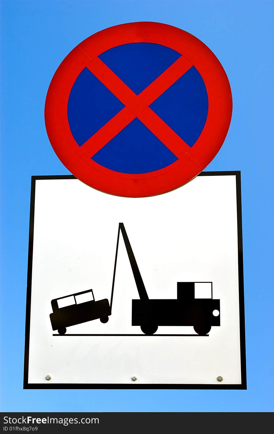 Photo of a No stopping (clear way) sign. Vehicle may be towed away. Photo of a No stopping (clear way) sign. Vehicle may be towed away.