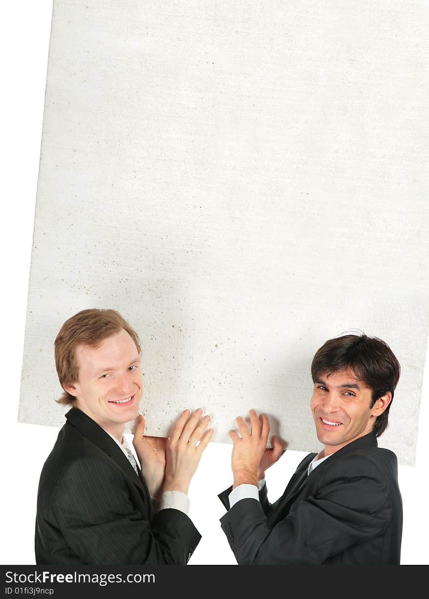 Two businessmen carry white plate foam plastic