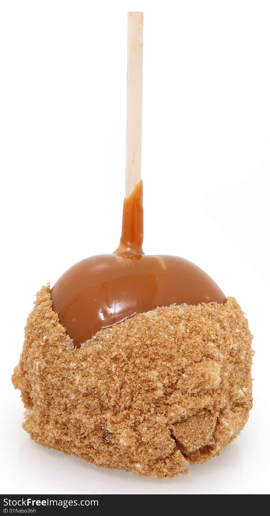 Apple on a stick dipped in caramel and apple pie crust. Apple on a stick dipped in caramel and apple pie crust