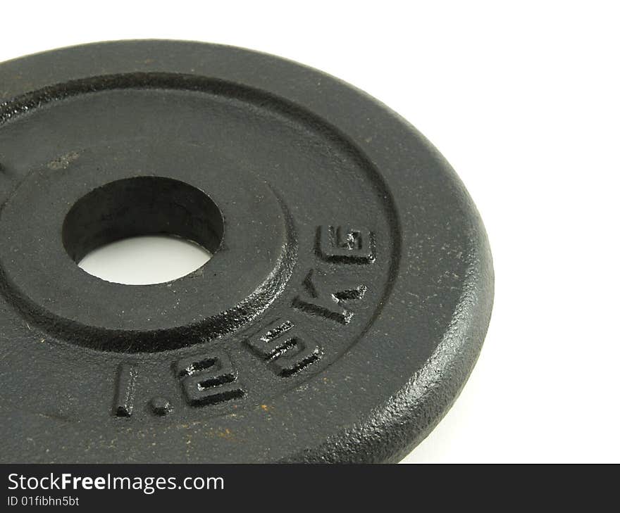 Black And Rusty Dumbbell Slice On White Background