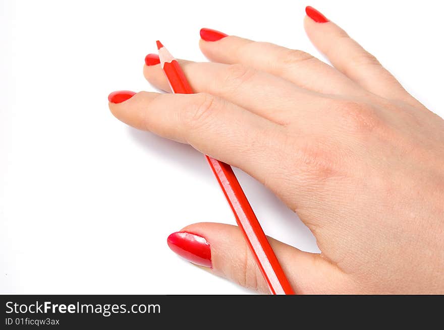 Red pencil in woman hand, isolated on white