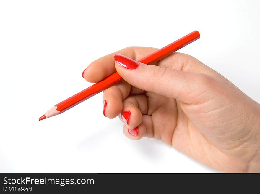 Red pencil in woman hand, isolated on white