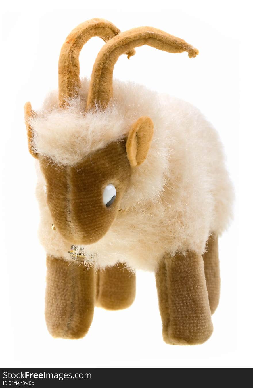 Little goat toy on white background