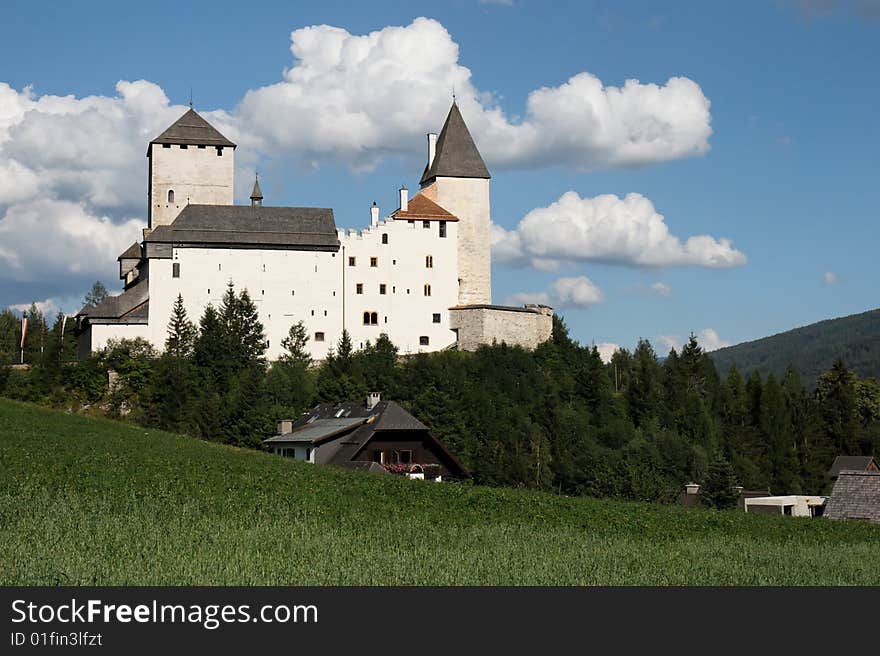 Medieval Castle Among Meadows And Forests