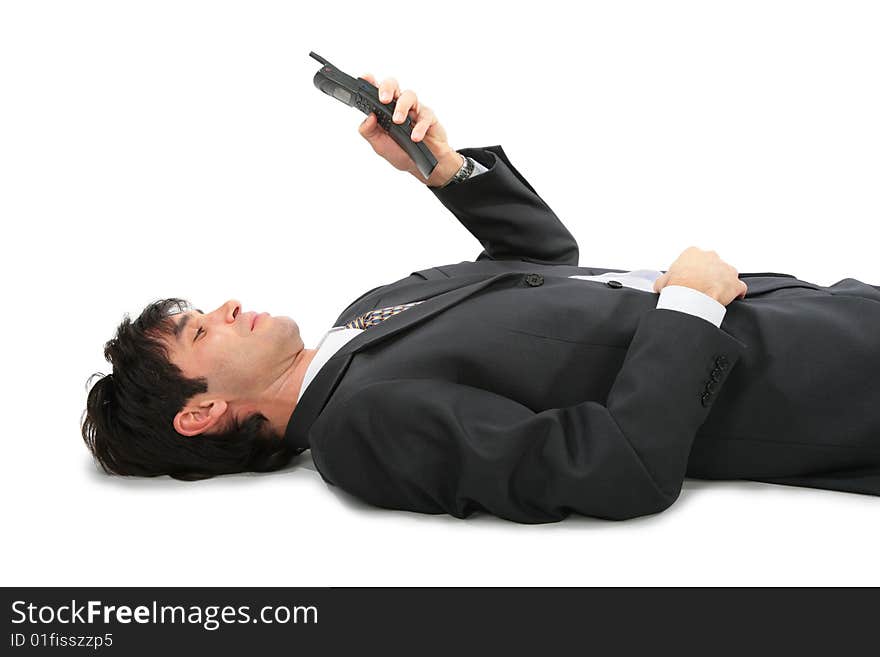 Lying on back businessman with phone on white background