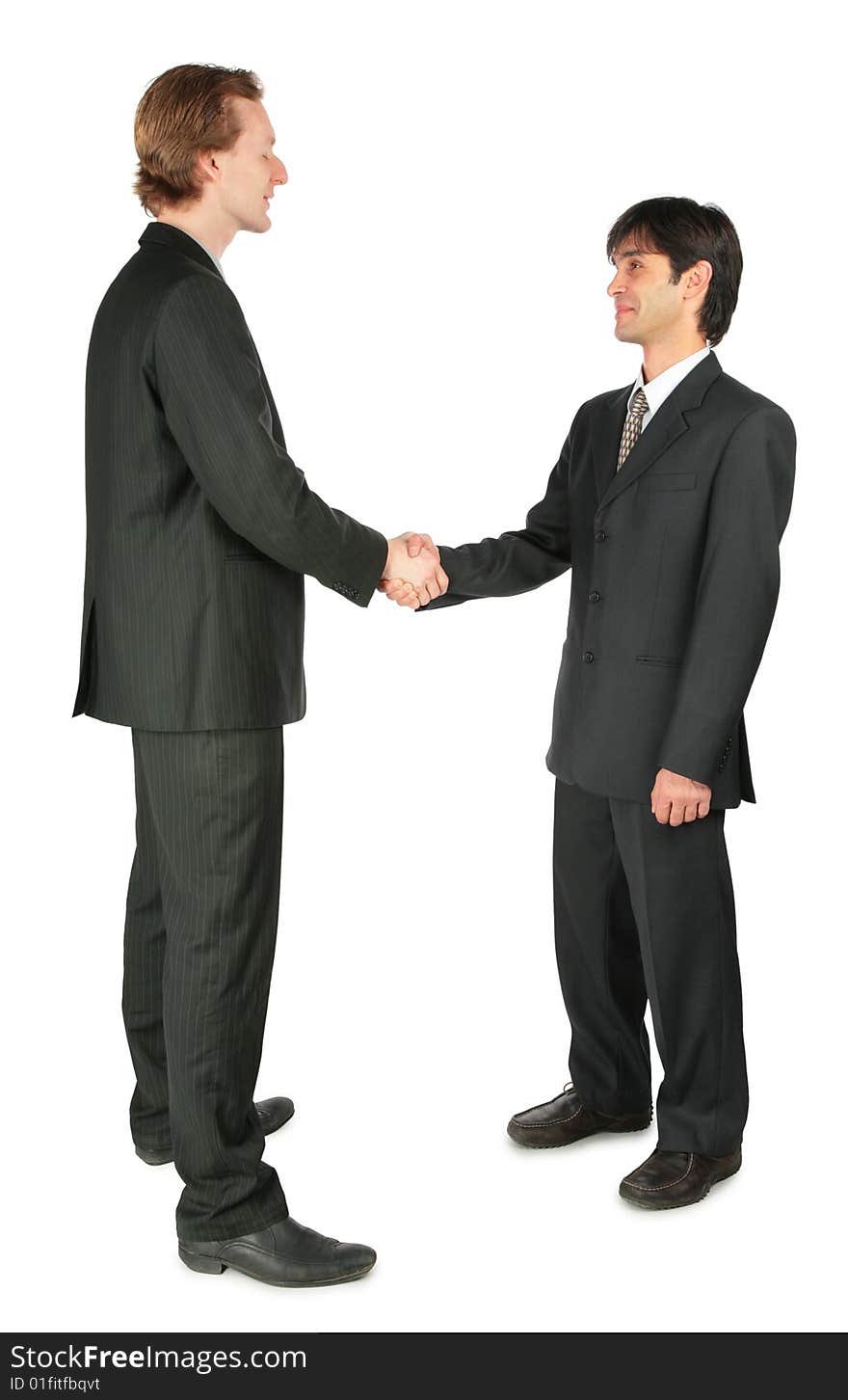 Two businessmen handshaking on white background