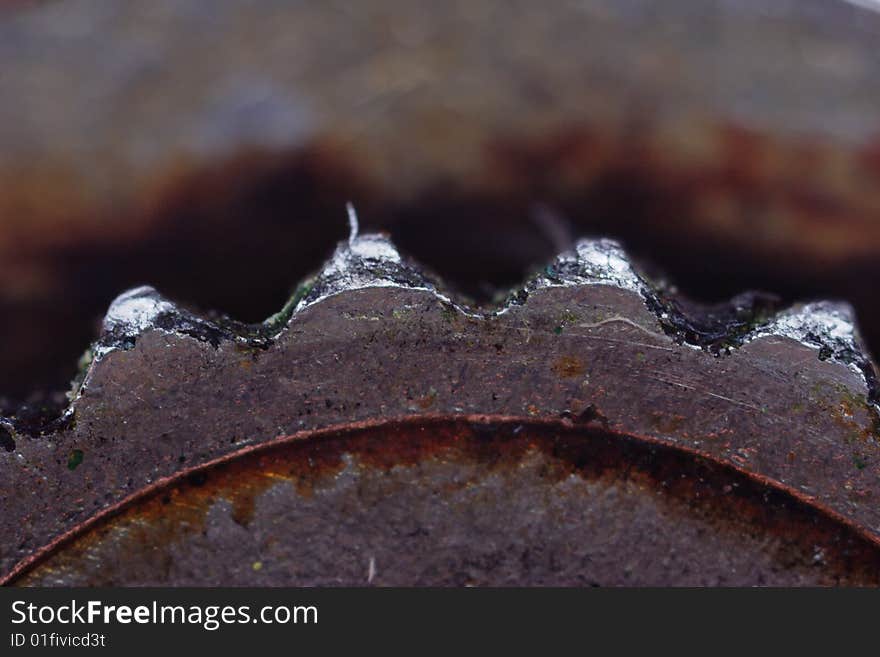 Can piercer isolated on the white background. Old and used. Narrow depth of field. Fragment. Can piercer isolated on the white background. Old and used. Narrow depth of field. Fragment.