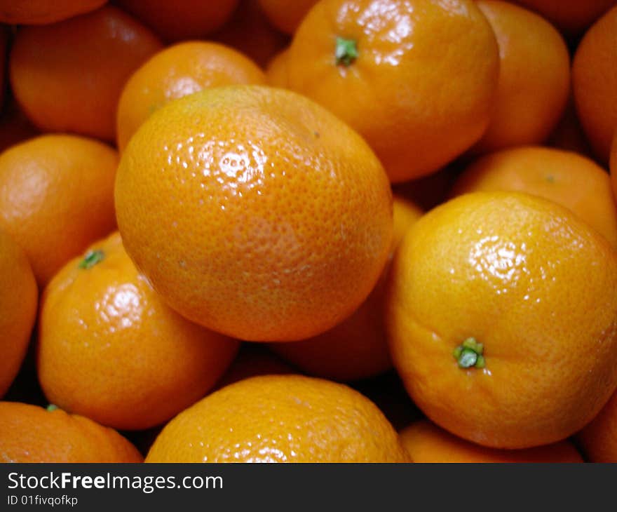 Macro shot of a group of Oranges.