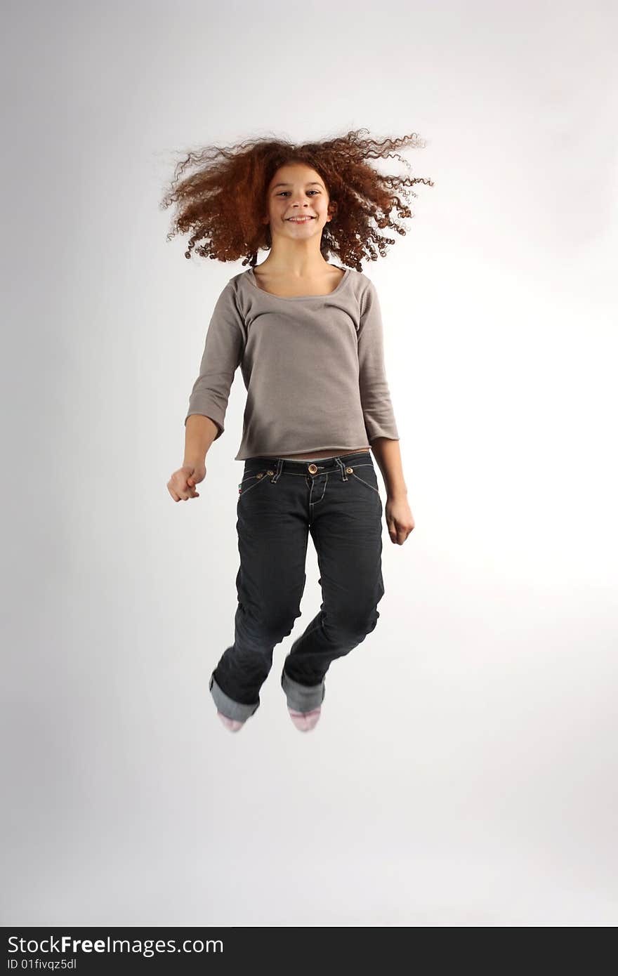 Portrait of a young teen jumping