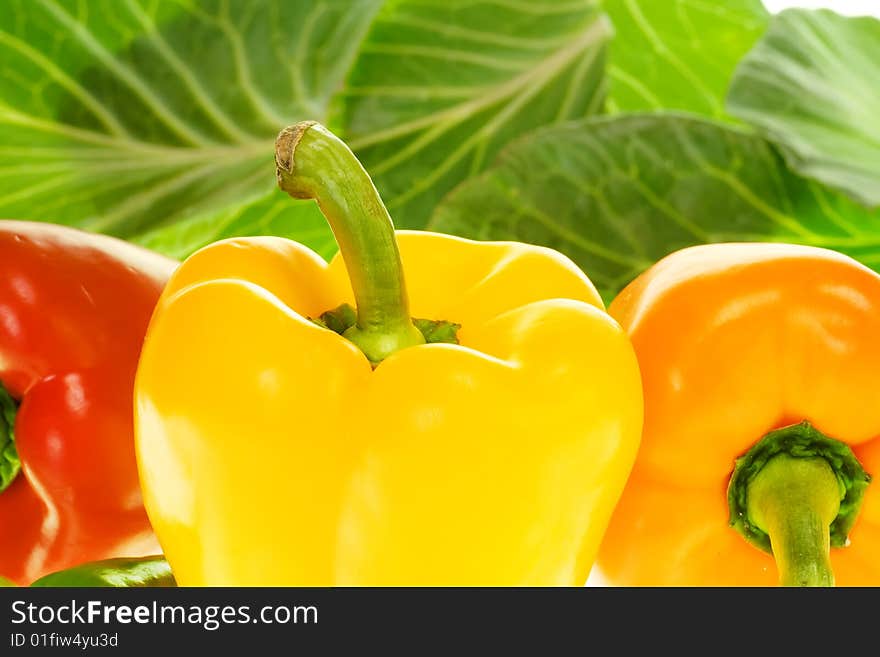 Peppers on background of the leaf