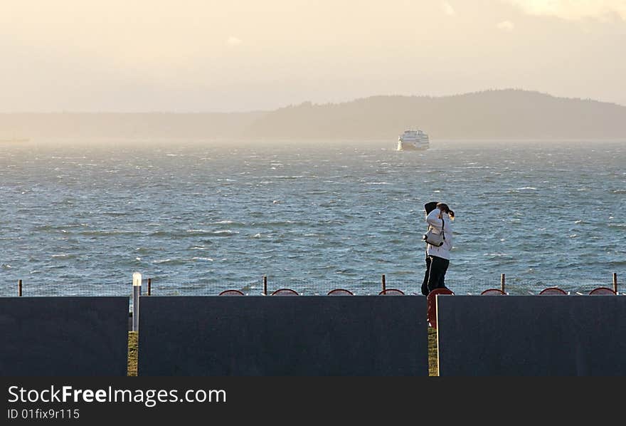 Couple walking on pathway by waters. Couple walking on pathway by waters