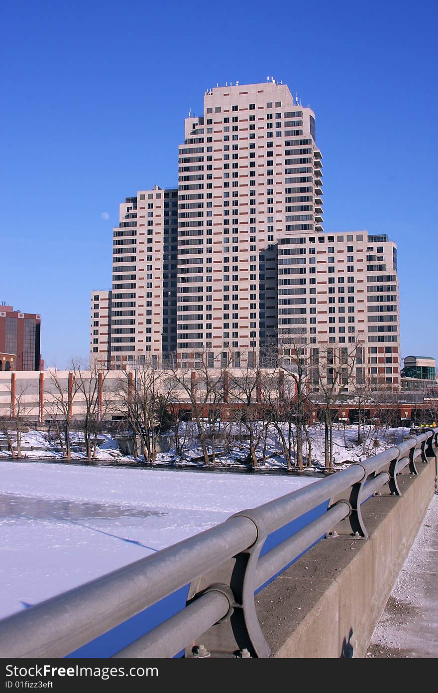 A skyscraper along the banks of the Grand River, Grand Rapids, MI. A skyscraper along the banks of the Grand River, Grand Rapids, MI