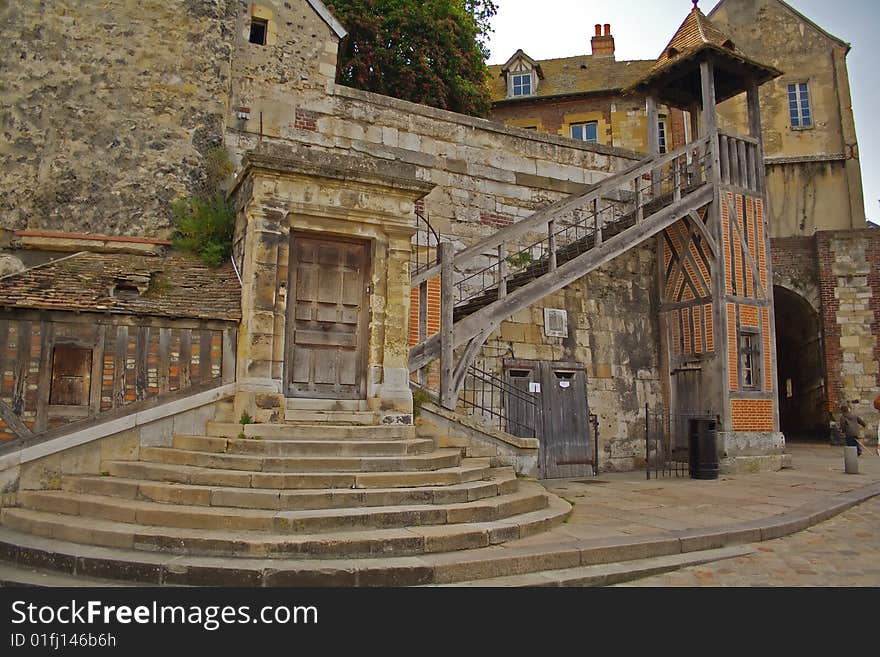 Building with circular stair in Honfleur's old city in Normandy, France. Building with circular stair in Honfleur's old city in Normandy, France