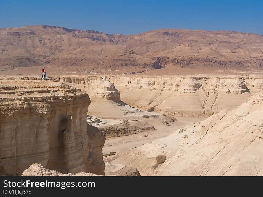 People on Perazim canyon cliff.