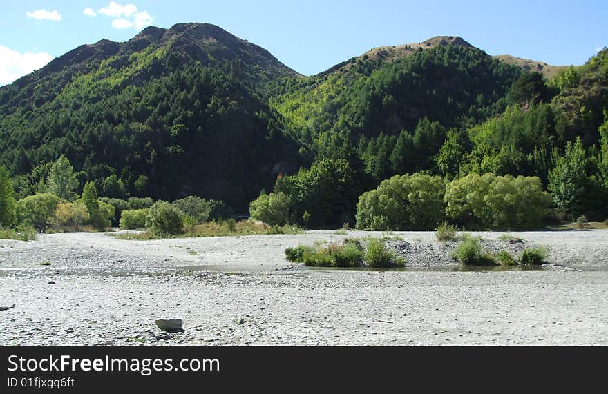 Riverbed with mountains