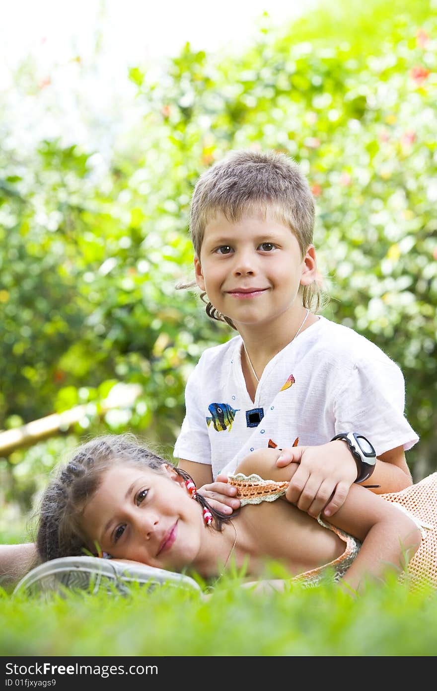 Portrait of little kids having good time in summer environment. Portrait of little kids having good time in summer environment