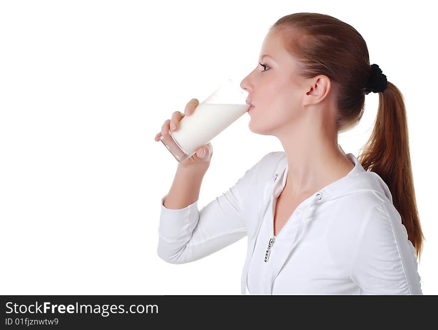 Young woman with glass of milk on white bacground