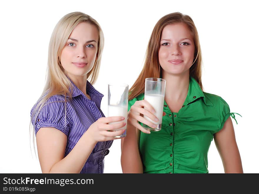 Two beautiful friends with two glass of milk. Two beautiful friends with two glass of milk