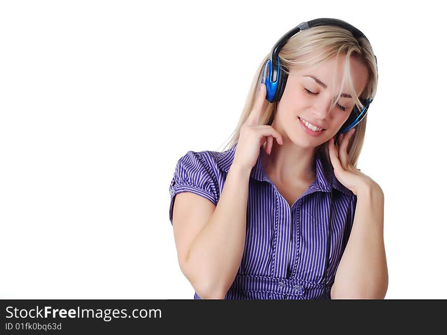 Young beautiful woman listening music with headpfones. Young beautiful woman listening music with headpfones