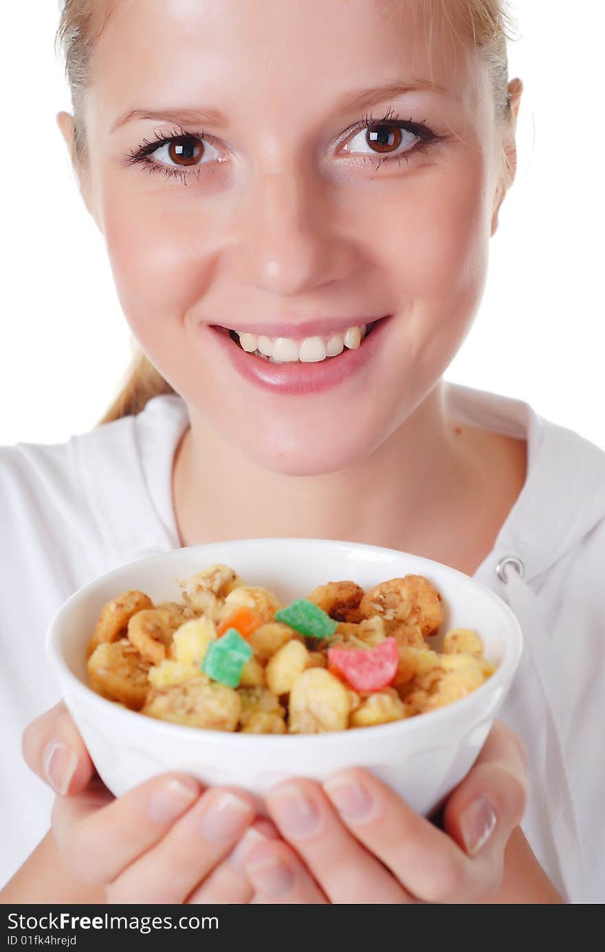 Portrait of young woman with plate of muesli. Portrait of young woman with plate of muesli