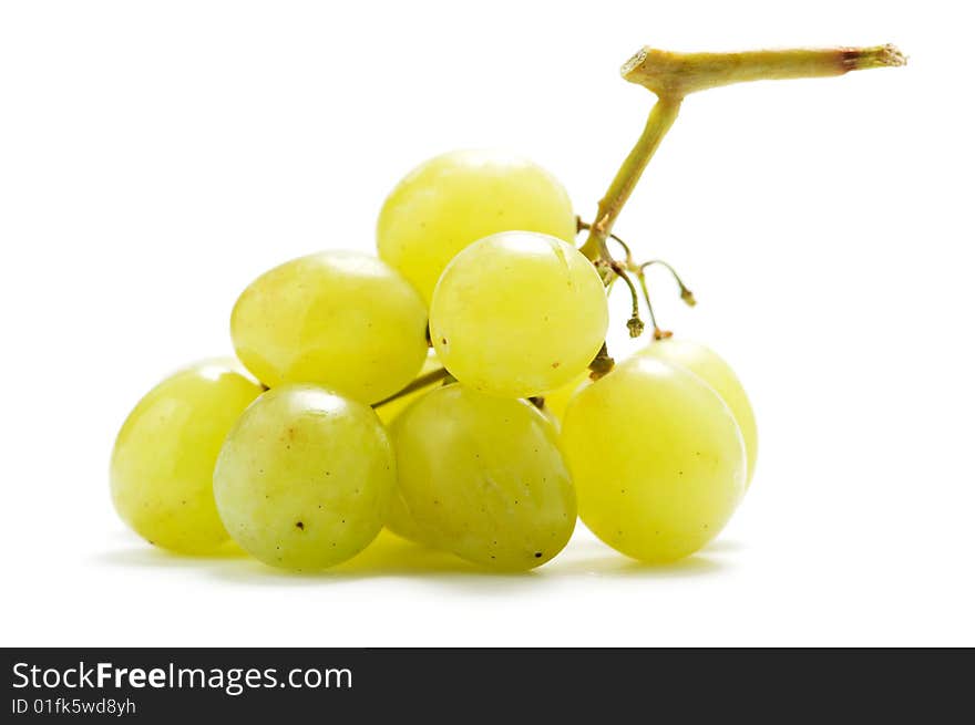 A small cluster of green grapes isolated on a white background.