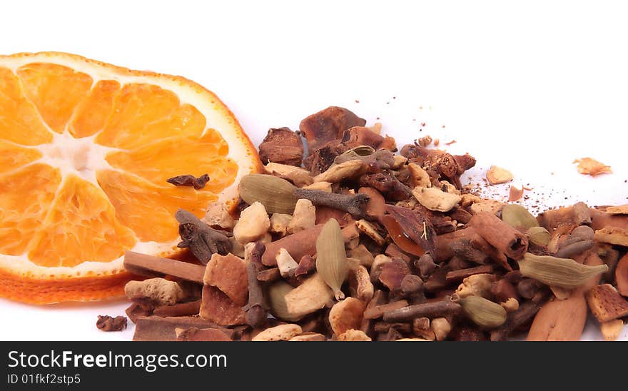 Assorted spices and orange