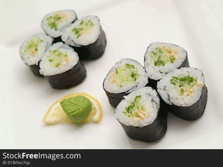 Traditional the Japanese meal sushi on a white background