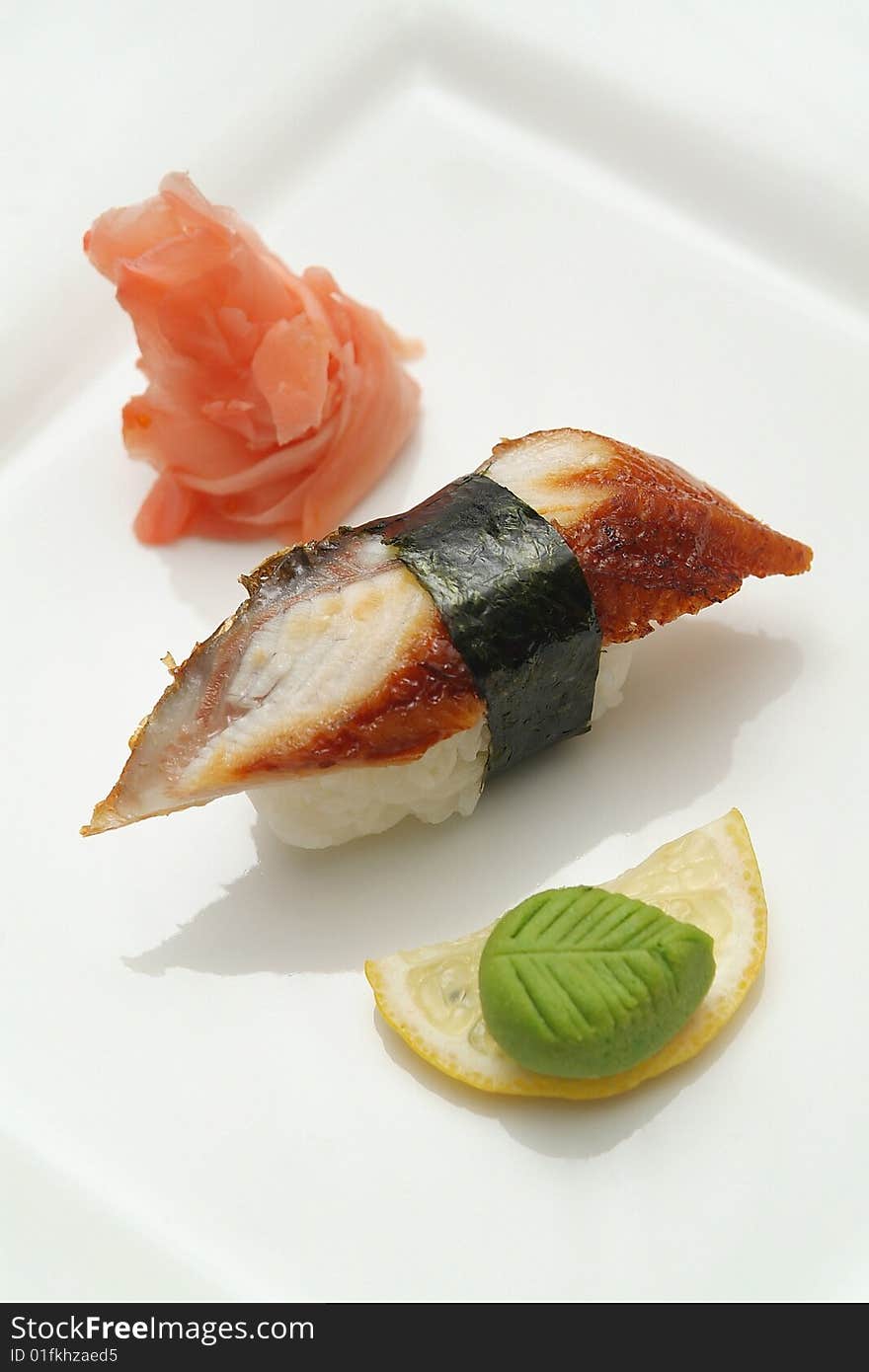 Traditional the Japanese meal sushi on a white background