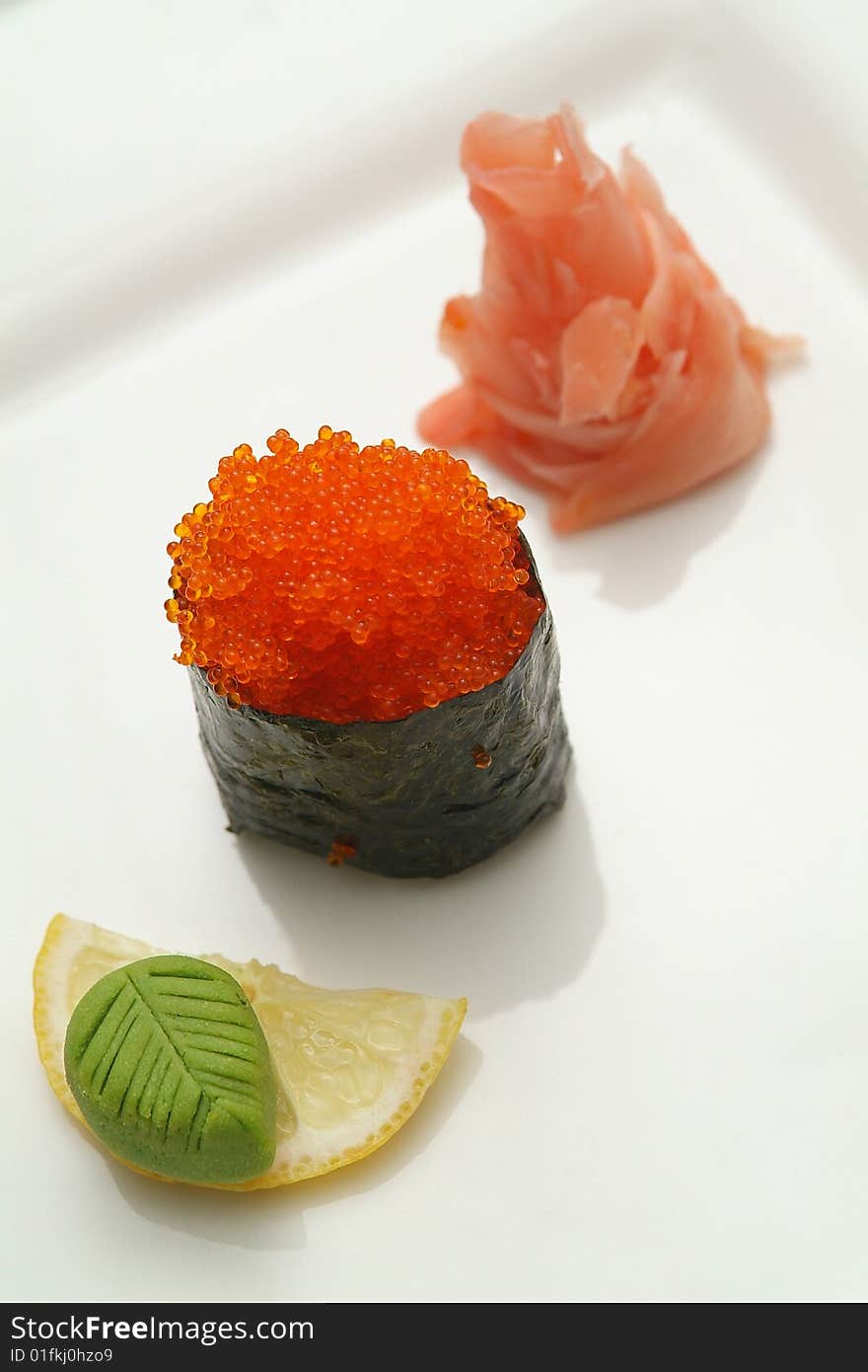 Traditional the Japanese meal sushi on a white background