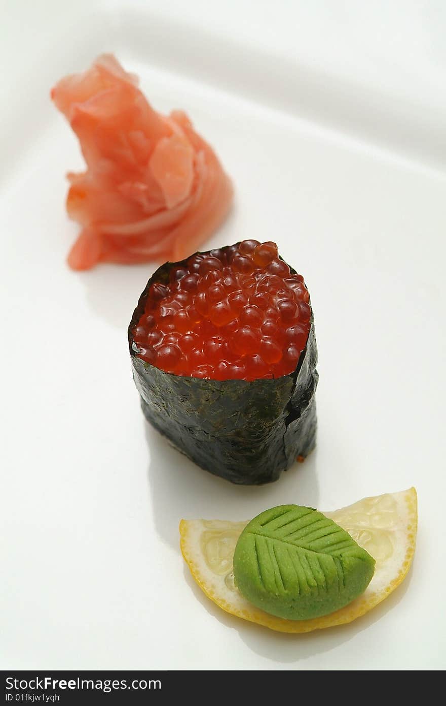 Traditional the Japanese meal sushi on a white background