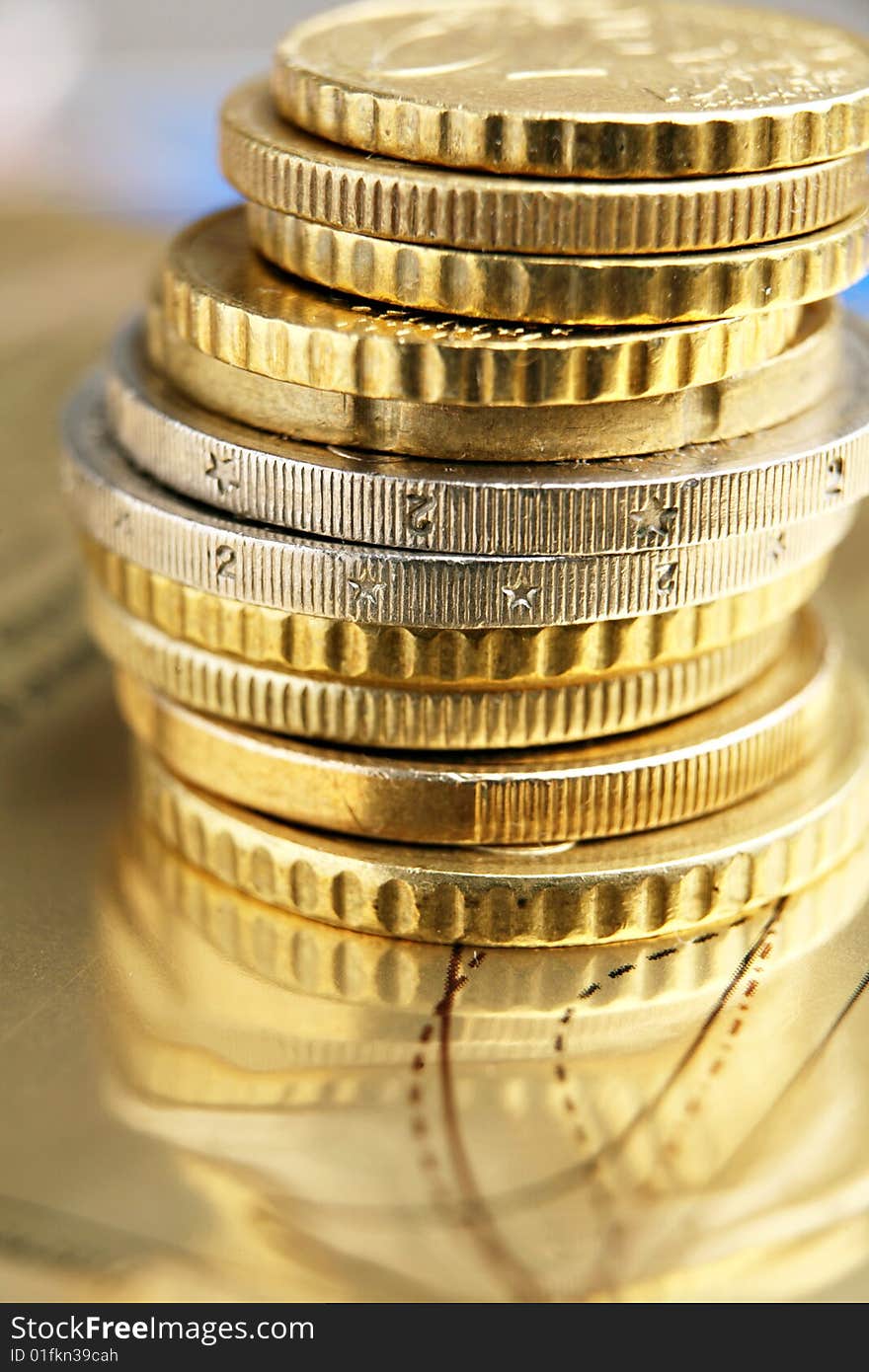 Pile of euro coins on golden background. Pile of euro coins on golden background.