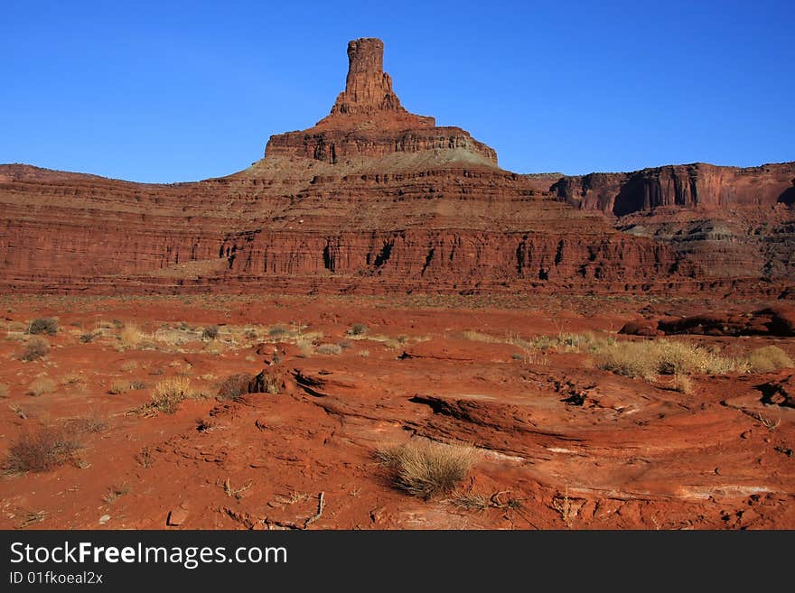 View of the red rock formations in Canyonlands National Park with blue sky�