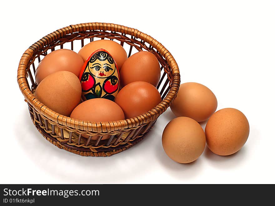 Easter egg in wooden basket