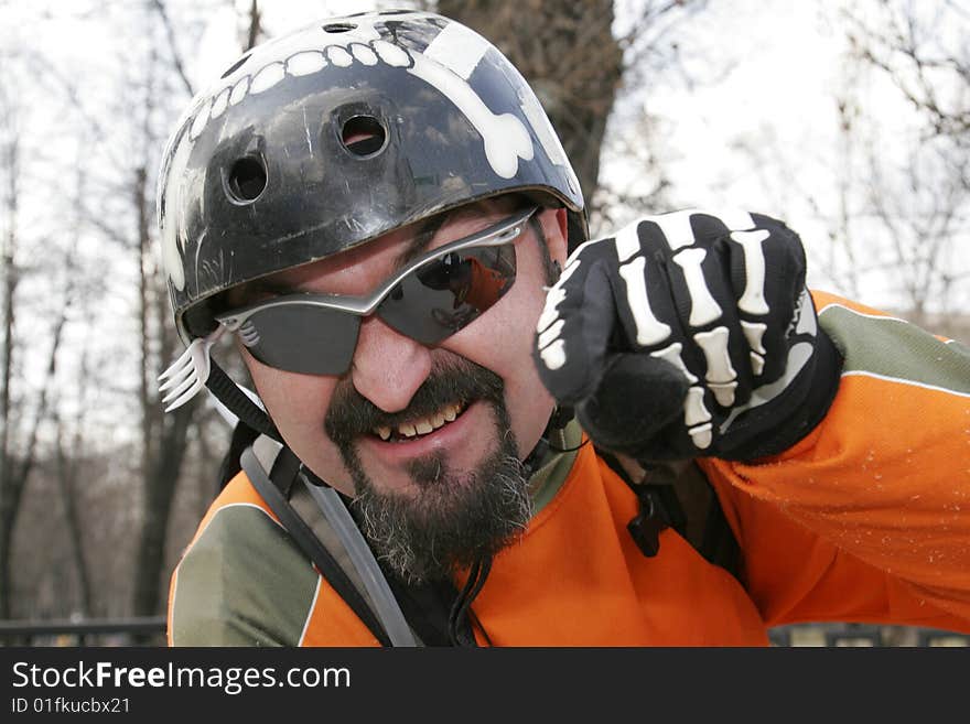 Smiling biker in black helmet